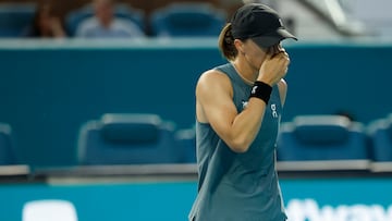 Mar 19, 2026; Miami Gardens, FL, USA; Iga Swiatek (POL) reacts after missing a shot against Magda Linette (POL) (not pictured) on day three of the 2026 Miami Open at Hard Rock Stadium. Mandatory Credit: Geoff Burke-Imagn Images