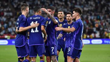 Argentina's midfielder Angel Di Maria (2nd L) celebrates with teammates after scoring during the friendly football match between Argentina and the United Arab Emirates at the Mohammed Bin Zayed Stadium in Abu Dhabi, on November 16, 2022. (Photo by Ryan LIM / AFP)