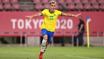 KASHIMA, JAPAN - AUGUST 03: Reinier #19 of Team Brazil celebrates after scoring their side&#039;s winning penalty during the penalty shoot out during the Men&#039;s Football Semi-final match between Mexico and Brazil on day eleven of the Tokyo 2020 Olympi