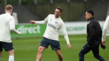 Psv Dutch forward Luuk De jong (C) fights for the ball with Psv US defender Sergino Dest (R) during a training session on the eve of the UEFA Champions League round of 16, first leg football match between against Borussia Dortmund at the Psv camp in Eindhoven on February 19, 2024. (Photo by JOHN THYS / AFP)