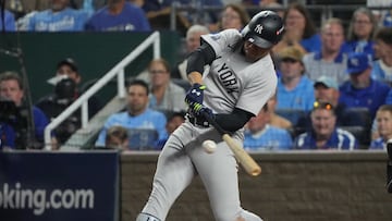 Oct 10, 2024; Kansas City, Missouri, USA; New York Yankees outfielder Juan Soto (22) swings at a pitch during the fifth inning against the Kansas City Royals during game four of the ALDS for the 2024 MLB Playoffs at Kauffman Stadium. Mandatory Credit: Denny Medley-Imagn Images