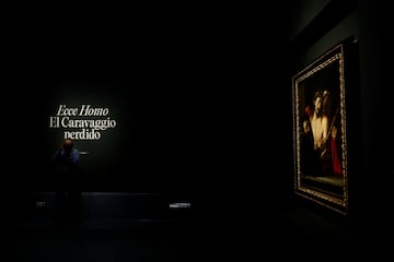 A photographer takes pictures of the painting "Ecce Homo" (Behold the Man) by Italian artist Caravaggio during a media presentation at Prado Museum in Madrid, Spain, May 27, 2024. REUTERS/Susana Vera