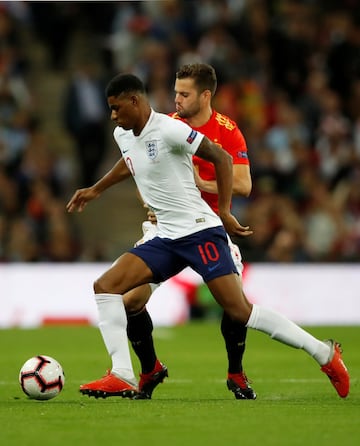 Marcus Rashford y Nacho Fernández.