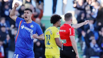 Getafe's Argentine defender #24 Zaid Romero Player celebrates as referee awards penalty against Villarrea during the Spanish league football match between Getafe CF and Villarreal CF at Coliseum Alfonso Perez Stadium in Getafe on February 14, 2026. (Photo by Oscar DEL POZO / AFP)