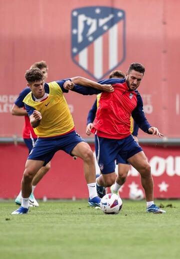 Aitor Gismera y Koke.