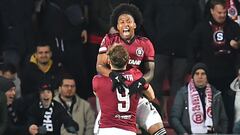 Sparta Praha's Ecuadorian defender #02 Angelo Preciado and Sparta Praha's Czech forward #09 Jan Kuchta celebrate during the UEFA Europa league knockout round play-off second leg football match between AC Sparta Praha (Prague) and Galatasaray SK in Prague on February 22, 2024. (Photo by Michal Cizek / AFP)