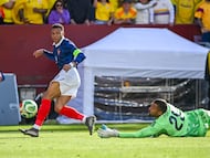 Mar 29, 2026; Landover, Maryland, USA; France forward Kylian Mbapp (10) shoots as Columbia goalie çlvaro Montero (25) dives during the second half at Northwest Stadium. Mandatory Credit: Tommy Gilligan-Imagn Images