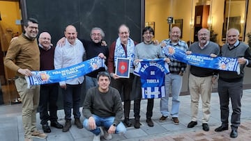 Varios integrantes de la Peña Real de Tudela con directivos del club txuri-urdin