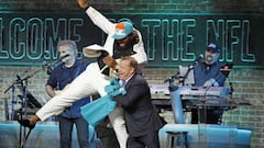 NASHVILLE, TENNESSEE - APRIL 25: Christian Wilkins jump into NFL Commissioner Roger Goodell after he is drafted thirteenth overall by the Miami Dolphins on day 1 of the 2019 NFL Draft on April 25, 2019 in Nashville, Tennessee.   Frederick Breedon/Getty Images/AFP
 == FOR NEWSPAPERS, INTERNET, TELCOS &amp; TELEVISION USE ONLY ==
