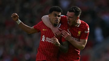 Liverpool's Colombian midfielder #07 Luis Diaz (L) celebrates with Liverpool's Scottish defender #26 Andrew Robertson (R) after scoring their first goal during the English Premier League football match between Liverpool and Tottenham Hotspur at Anfield in Liverpool, north west England on April 27, 2025. (Photo by Paul ELLIS / AFP) / RESTRICTED TO EDITORIAL USE. No use with unauthorized audio, video, data, fixture lists, club/league logos or 'live' services. Online in-match use limited to 120 images. An additional 40 images may be used in extra time. No video emulation. Social media in-match use limited to 120 images. An additional 40 images may be used in extra time. No use in betting publications, games or single club/league/player publications. /