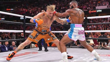 CLEVELAND, OHIO - AUGUST 29: Jake Paul fights Tyron Woodley in their cruiserweight bout during a Showtime pay-per-view event at Rocket Morgage Fieldhouse on August 29, 2021 in Cleveland, Ohio.   Jason Miller/Getty Images/AFP
 == FOR NEWSPAPERS, INTERNET, 