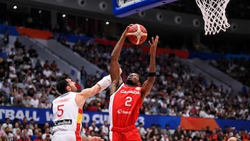 Canada�s Shai Gilgeous-Alexander (R) and Rudy Fernandez (L) vie for a ball during the FIBA Basketball World Cup match between Spain and Canada at Indonesia Arena in Jakarta on September 3, 2023. (Photo by ADEK BERRY / AFP)