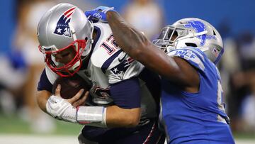DETROIT, MI - SEPTEMBER 23: Tom Brady #12 of the New England Patriots is sacked in the fourth quarter by Eli Harold #57 of the Detroit Lions at Ford Field on September 23, 2018 in Detroit, Michigan.   Gregory Shamus/Getty Images/AFP
 == FOR NEWSPAPERS, IN