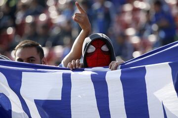 Hinchas de Universidad de Chile asisten al partido de primera division contra Colo Colo disputado en el estadio Nacional de Santiago, Chile.