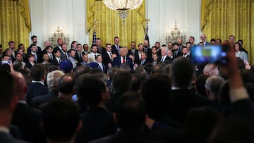 U.S. President Donald Trump speaks during a ceremony honoring the members of the 2024 World Series Champion Los Angeles Dodgers in the East Room at the White House in Washington, D.C., U.S., April 7, 2025. REUTERS/Leah Millis