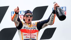 Honda Spanish rider Marc Marquez celebrates on the podium after winning the German MotoGP Grand Prix at the Sachsenring racing circuit in Hohenstein-Ernstthal near Chemnitz, eastern Germany, on June 20, 2021. (Photo by Ronny HARTMANN / AFP)