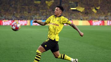 Dortmund's English midfielder #10 Jadon Sancho runs for the ball during the UEFA Champions League semi-final first leg football match between Borussia Dortmund and Paris Saint-Germain (PSG) in Dortmund, western Germany on May 1, 2024. (Photo by FRANCK FIFE / AFP)