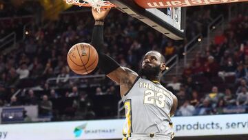 Mar 1, 2018; Cleveland, OH, USA; Cleveland Cavaliers forward LeBron James (23) slam dunks during the second half against the Philadelphia 76ers at Quicken Loans Arena. Mandatory Credit: Ken Blaze-USA TODAY Sports