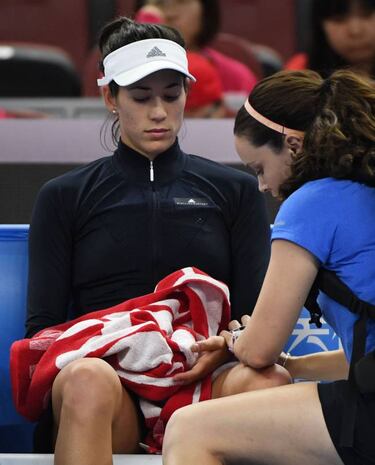 Spaniard Muguruza retires ill in China Open first round