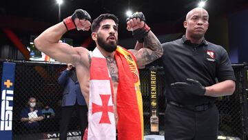 LAS VEGAS, NEVADA - DECEMBER 05: Ilia Topuria of Germany celebrates after his knockout victory over Damon Jackson in a featherweight bout during the UFC Fight Night event at UFC APEX on December 05, 2020 in Las Vegas, Nevada. (Photo by Chris Unger/Zuffa L