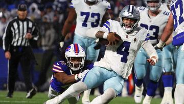 ORCHARD PARK, NEW YORK - DECEMBER 17: Dorian Williams #42 of the Buffalo Bills tackles Dak Prescott #4 of the Dallas Cowboys during the fourth quarter at Highmark Stadium on December 17, 2023 in Orchard Park, New York. Timothy T Ludwig/Getty Images/AFP (Photo by Timothy T Ludwig / GETTY IMAGES NORTH AMERICA / Getty Images via AFP)