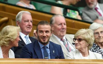 David Beckham and his mother Sandra enjoying today's action at Wimbledon.