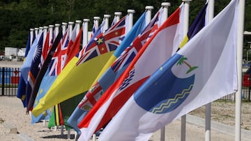 (FILES) This file picture taken on September 5, 2018 shows flags from the Pacific Islands countries being displayed in Yaren on the last day of the Pacific Islands Forum (PIF). - Palau announced it would withdraw from the Pacific Islands Forum on February
