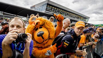 SPIELBERG - Fans of Max Verstappen watch the pitlane on the Red Bull Ring race track in the run-up to the Austrian Grand Prix. ANP SEM VAN DER WAL (Photo by ANP via Getty Images)