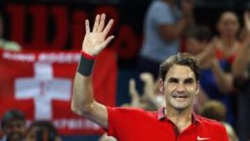 Federer celebra su triunfo ante Millman
