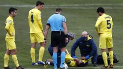 HUESCA, SPAIN - JANUARY 23: Raul Albiol of Villarreal CF receives medical treatment during the La Liga Santander match between SD Huesca and Villarreal CF at Estadio El Alcoraz on January 23, 2021 in Huesca, Spain. Sporting stadiums around Spain remain un