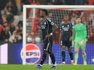 Real Madrid's Brazilian forward #07 Vinicius Junior reacts after Benfica's fourth goal during the UEFA Champions League league phase day 8 football match between SL Benfica and Real Madrid CF at Estadio da Luz in Lisbon on January 28, 2026. (Photo by PATRICIA DE MELO MOREIRA / AFP)