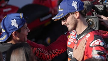 New world champion Ducati Spanish rider Jorge Martin (L) is congratulated by runner-up Ducati Italian rider Francesco Bagnaia after the MotoGP Solidarity Grand Prix of Barcelona at the Circuit de Catalunya on November 17, 2024 in Montmelo on the outskirts of Barcelona. Jorge Martin won the MotoGP world title after taking a 24-point lead into the final weekend of the season in Barcelona. (Photo by Manaure Quintero / AFP)