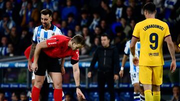 Barcelona's Portuguese forward #14 Joao Felix reacts on the ground during the Spanish league football match between Real Sociedad and FC Barcelona at the Anoeta stadium in San Sebastian on November 4, 2023. (Photo by ANDER GILLENEA / AFP)