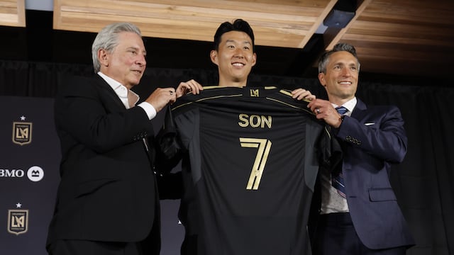 LOS ANGELES, CA AUGUST 6, 2025 -- The Los Angeles Football Club introduced their acquisition of South Korean national Son Heung-min, center, on Wednesday, Aug. 6, 2025. One the left is LAFC managing owner Bennett Rosenthal. On the right is LAFC co-president and general manager John Thorrington. The 33-year-old forward signed with LAFC after 10 seasons with Tottenham Hotspur of England's Premier League. (Carlin Stiehl / Los Angeles Times via Getty Images)