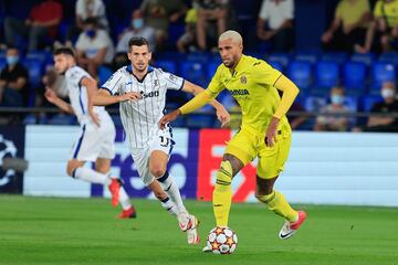 Etienne Capoue y Remo Freuler.