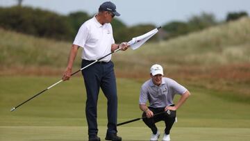 LYTHAM ST ANNES, ENGLAND - JUNE 15: Jonathan Broomhead of South Africa and his caddie line up a putt on the 15th green during day three of the R&A Amateur Championship at Royal Lytham & St. Annes on June 15, 2022 in Lytham St Annes, England. (Photo by Matthew Lewis/R&A/R&A via Getty Images)