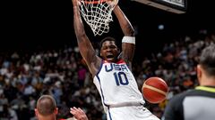 USA's Anthony Edwards dunks the ball during the Basketball Showcase friendly match between the USA and Germany at the Etihad Arena in Abu Dhabi on August 20, 2023. (Photo by Giuseppe CACACE / AFP)