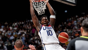 USA's Anthony Edwards dunks the ball during the Basketball Showcase friendly match between the USA and Germany at the Etihad Arena in Abu Dhabi on August 20, 2023. (Photo by Giuseppe CACACE / AFP)