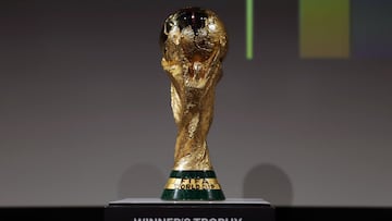 Soccer Football - FIFA World Cup 2026 - Panel with FIFA legends ahead of World Cup Draw - John F. Kennedy Center for the Performing Arts, Washington, D.C., U.S. - December 3, 2025 The World Cup Trophy is displayed REUTERS/Jeenah Moon