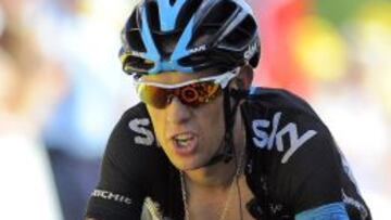 TDF205 CHAMROUSSE (FRANCIA), 18/07/2014.- El ciclista australiano Richie Porte, del equipo Sky, en acción durante la decimotercera etapa del Tour de Francia, de 197,5 kilómetros entre las localidades de Saint-Etienne y Chamrousse, Francia, hoy, viernes 18 de julio de 2014. Porte sufrió hoy un desfallecimiento en el ascenso al puerto final. EFE EFE/Nicolas Bouvy