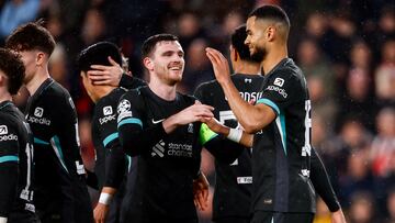 EINDHOVEN, NETHERLANDS - JANUARY 29: Cody Gakpo of Liverpool FC celebrates after scoring his teams first goal (penalty), Andrew Robertson of Liverpool FC during the UEFA Champions League 2024/25 League Phase MD8 match between PSV Eindhoven and Liverpool FC at PSV Stadion on January 29, 2025 in Eindhoven, Netherlands. (Photo by Broer van den Boom/BSR Agency/Getty Images)
