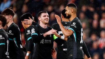 EINDHOVEN, NETHERLANDS - JANUARY 29: Cody Gakpo of Liverpool FC celebrates after scoring his teams first goal (penalty), Andrew Robertson of Liverpool FC during the UEFA Champions League 2024/25 League Phase MD8 match between PSV Eindhoven and Liverpool FC at PSV Stadion on January 29, 2025 in Eindhoven, Netherlands. (Photo by Broer van den Boom/BSR Agency/Getty Images)