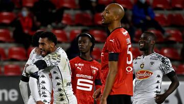 Angers' players celebrate after scoring a goal during the French L1 football match between Stade Rennais and Angers, at the Roazhon Park stadium in Rennes, northwestern France on October 23, 2020. (Photo by Damien MEYER / AFP)