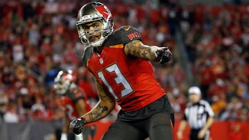 Dec 11, 2016; Tampa, FL, USA; Tampa Bay Buccaneers wide receiver Mike Evans (13) points against the New Orleans Saints during the second half at Raymond James Stadium. Tampa Bay Buccaneers defeated the New Orleans Saints 16-11. Mandatory Credit: Kim Klement-USA TODAY Sports