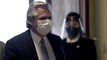Argentina's President Alberto Fernandez arrives at Casa Rosada Presidential Palace to announce the restructure of a $66 billion foreign-law debt, in Buenos Aires on August 31, 2020 amid the COVID-19 novel coronavirus pandemic. - Recession-hit Argentina has managed to restructure 99 percent of a $66 billion debt issued under foreign legislation, Economy Minister Martin Guzman announced on Monday, following months of strained talks and several missed deadlines. (Photo by Juan MABROMATA / AFP)