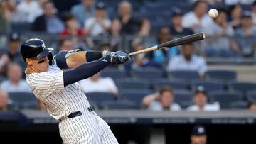 Jun 4, 2024; Bronx, New York, USA; New York Yankees center fielder Aaron Judge (99) hits a two run double against the Minnesota Twins during the third inning at Yankee Stadium. Mandatory Credit: Brad Penner-USA TODAY Sports