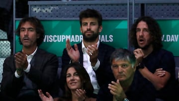 Puyol junto a Piqué, en un partido de la Copa Davis.