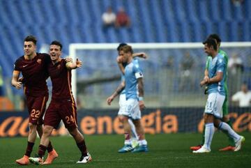 Roma's Alessandro Florenzi and Stephan El Shaarawy celebrate their comprehensive victory over city rivals Lazio.