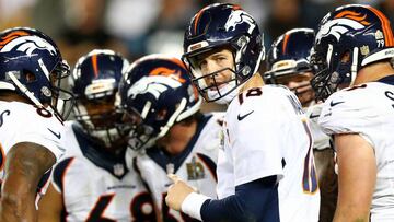 SANTA CLARA, CA - FEBRUARY 07: Peyton Manning #18 of the Denver Broncos looks on in the fourth quarter against the Carolina Panthers during Super Bowl 50 at Levi's Stadium on February 7, 2016 in Santa Clara, California. Ronald Martinez/Getty Images/AFP