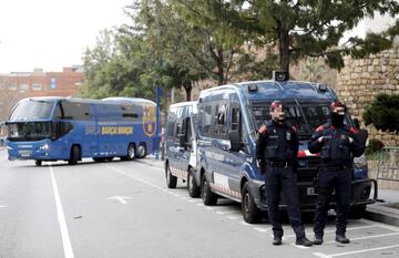 Mossos d'Esquadra, the Catalonia regional police force, keeping a watchful eye as the Barça team bus makes its way to the hotel.